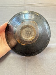 A rare Chinese black-glazed 'oil-spot' tea bowl, Song/Jin