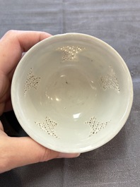 A pair of reticulated Chinese blue and white 'Hatcher Cargo' shipwreck bowls, Transitional period