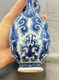 A rare and fine Chinese blue and white double gourd 'dragon' vase with ruyi handles, Qianlong mark and of the period