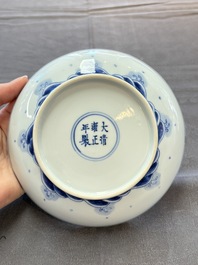A Chinese blue and white 'dragon and carps' plate, Yongzheng mark and of the period