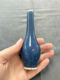 A pair of Chinese blue-glazed 'Hatcher Cargo' shipwreck bottle vases with incised dragons, Transitional period