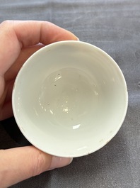 A Chinese iron-red-decorated 'Deer Hunting' cup and saucer, Qianlong