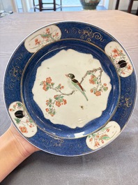 A pair of fine Chinese famille verte powder-blue-ground 'bird on branch' plates, Kangxi