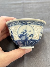 A pair of reticulated Chinese blue and white 'Hatcher Cargo' shipwreck bowls, Transitional period