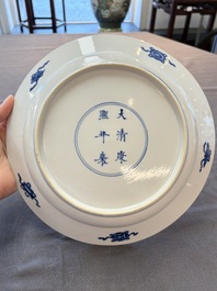 Two Chinese blue and white plates with figural design, Kangxi marks and of the period