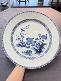 Five Chinese blue and white 'birds and flowers' and 'peony scroll' plates and dishes, 18/19th C.