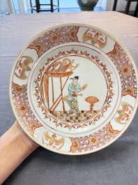A rare Chinese polychrome 'Commedia dell'arte' 'South Sea Bubble' plate, Yongzheng, ca. 1720-1725