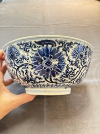 A Chinese blue and white 'lotus scroll' bowl, Xuande mark, Kangxi