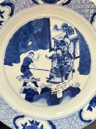 Two Chinese blue and white plates with figural design, Kangxi marks and of the period