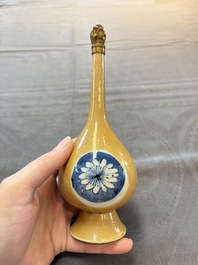 A Chinese blue, white and caf&eacute;-au-lait-ground and a blue and white rose water sprinkler, Kangxi
