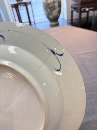 Five Chinese blue and white 'birds and flowers' and 'peony scroll' plates and dishes, 18/19th C.