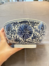 A Chinese blue and white 'lotus scroll' bowl, Xuande mark, Kangxi