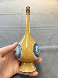 A Chinese blue, white and caf&eacute;-au-lait-ground and a blue and white rose water sprinkler, Kangxi