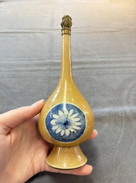 A Chinese blue, white and caf&eacute;-au-lait-ground and a blue and white rose water sprinkler, Kangxi