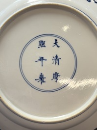 Two Chinese blue and white plates with figural design, Kangxi marks and of the period