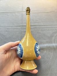 A Chinese blue, white and caf&eacute;-au-lait-ground and a blue and white rose water sprinkler, Kangxi
