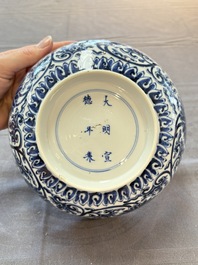 A Chinese blue and white 'lotus scroll' bowl, Xuande mark, Kangxi