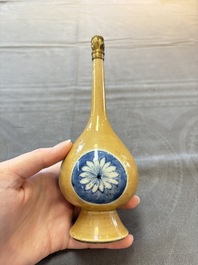 A Chinese blue, white and caf&eacute;-au-lait-ground and a blue and white rose water sprinkler, Kangxi