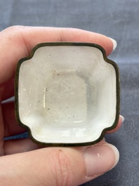 A Chinese Canton saucer, a cup and a covered box, 18th C.