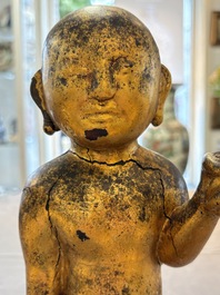 A rare and large Chinese gilt-lacquered bronze Buddha, Ming
