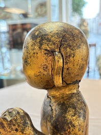 A rare and large Chinese gilt-lacquered bronze Buddha, Ming