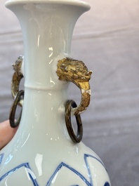 A pair of Chinese blue and white 'Long Eliza and playing boys' vases, Kangxi
