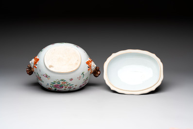 A Chinese famille rose 'mascarons' tureen and cover on stand with floral design, Qianlong