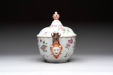 A Chinese famille rose 'mascarons' tureen and cover on stand with floral design, Qianlong