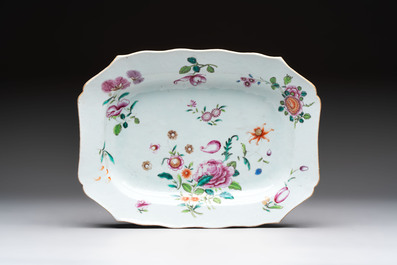 A Chinese famille rose 'mascarons' tureen and cover on stand with floral design, Qianlong