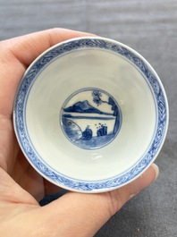 A pair of Chinese blue and white 'Elegant Beauty and Boy' cups and saucers, Chenghua mark, Kangxi