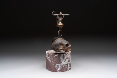 An Italian 'vanitas' or 'memento mori' composition with skulls and forged iron mount, 18/19th C.