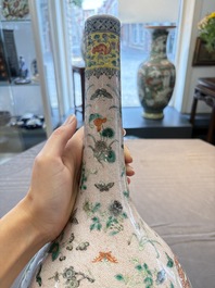 A Chinese famille verte bottle vase, 19th C.
