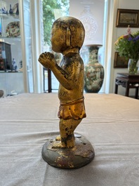 A rare and large Chinese gilt-lacquered bronze Buddha, Ming
