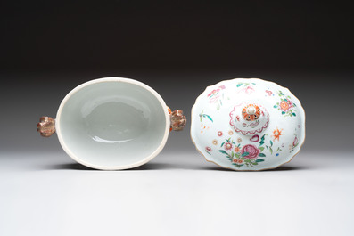 A Chinese famille rose 'mascarons' tureen and cover on stand with floral design, Qianlong
