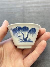 A pair of Chinese blue and white 'Elegant Beauty and Boy' cups and saucers, Chenghua mark, Kangxi