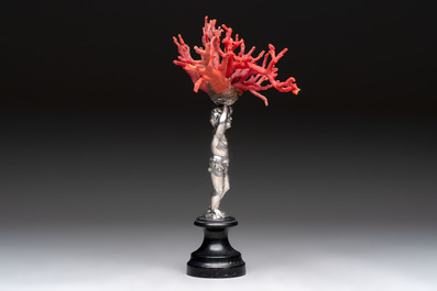 A red coral mounted silver figure, possibly Germany, 19th C.