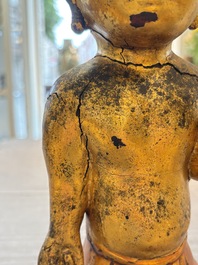 A rare and large Chinese gilt-lacquered bronze Buddha, Ming