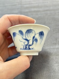 A pair of Chinese blue and white 'Elegant Beauty and Boy' cups and saucers, Chenghua mark, Kangxi