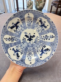 Nine Chinese blue and white plates with figural design, 18th C.