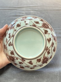 A Chinese copper-red plate with figural design, possibly Ming
