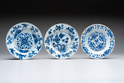 12 Chinese blue and white plates with figural and floral design, 18th C.