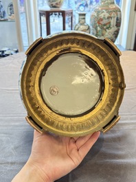 A gilt-bronze-mounted Chinese blue and white bottle vase with floral design, 19/20th C.
