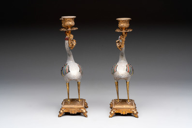 A pair of Chinese cloisonn&eacute; cranes, later mounted as candelabras, 19th C.