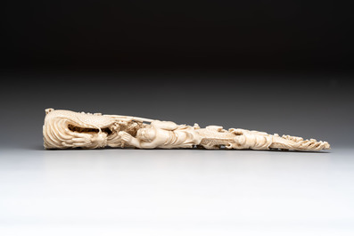 A Chinese ivory carving depicting a Luohan and a dragon, 'Da Ming 大明' mark, 19/20th C.
