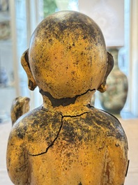 A rare and large Chinese gilt-lacquered bronze Buddha, Ming