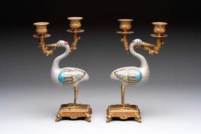 A pair of Chinese cloisonn&eacute; cranes, later mounted as candelabras, 19th C.