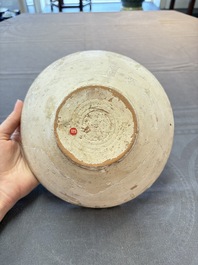 A Samanid pottery 'Kufic' inscribed bowl and a white-spotted brown-ground bowl, Iran, 10th C.