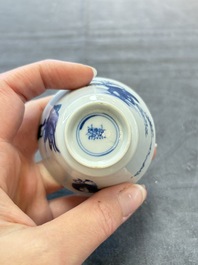 A pair of Chinese blue and white 'elegant beauty and boy' cups and saucers, Chenghua mark, Kangxi