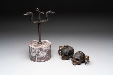 An Italian 'vanitas' or 'memento mori' composition with skulls and forged iron mount, 18/19th C.
