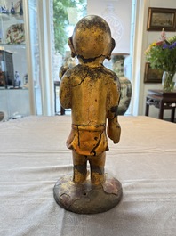A rare and large Chinese gilt-lacquered bronze Buddha, Ming